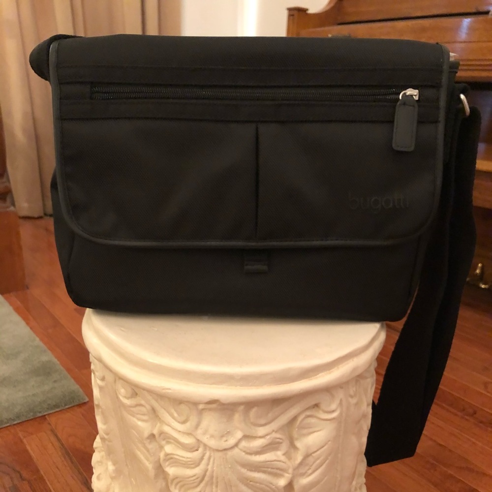 Small black messenger bag.